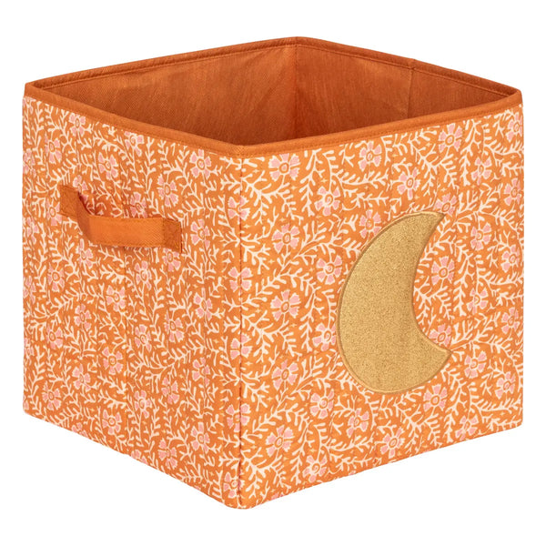Pink storage box with pompoms